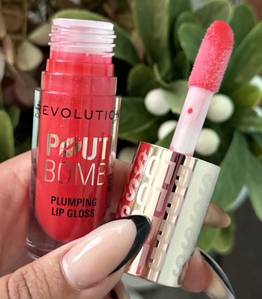 The New Revolution Beauty, Pout Bomb Plumping Lip Gloss!