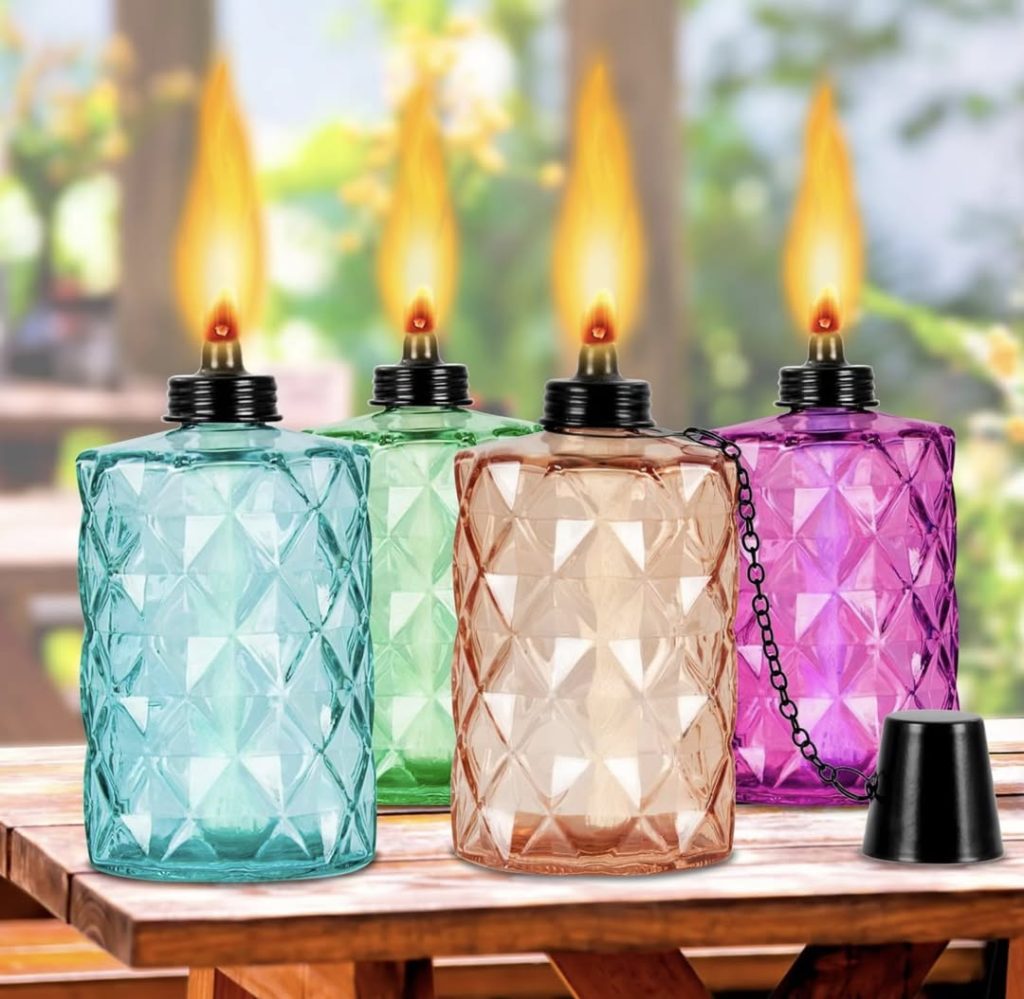 set of four glass table top torches