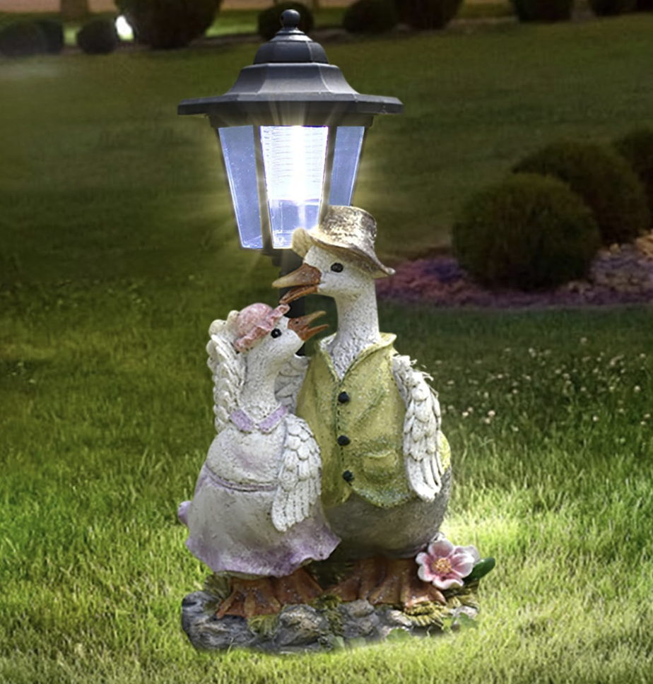 Solar Goose Couple Statue Set